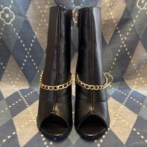 Glaze Black Heeled Boots with Gold Chain